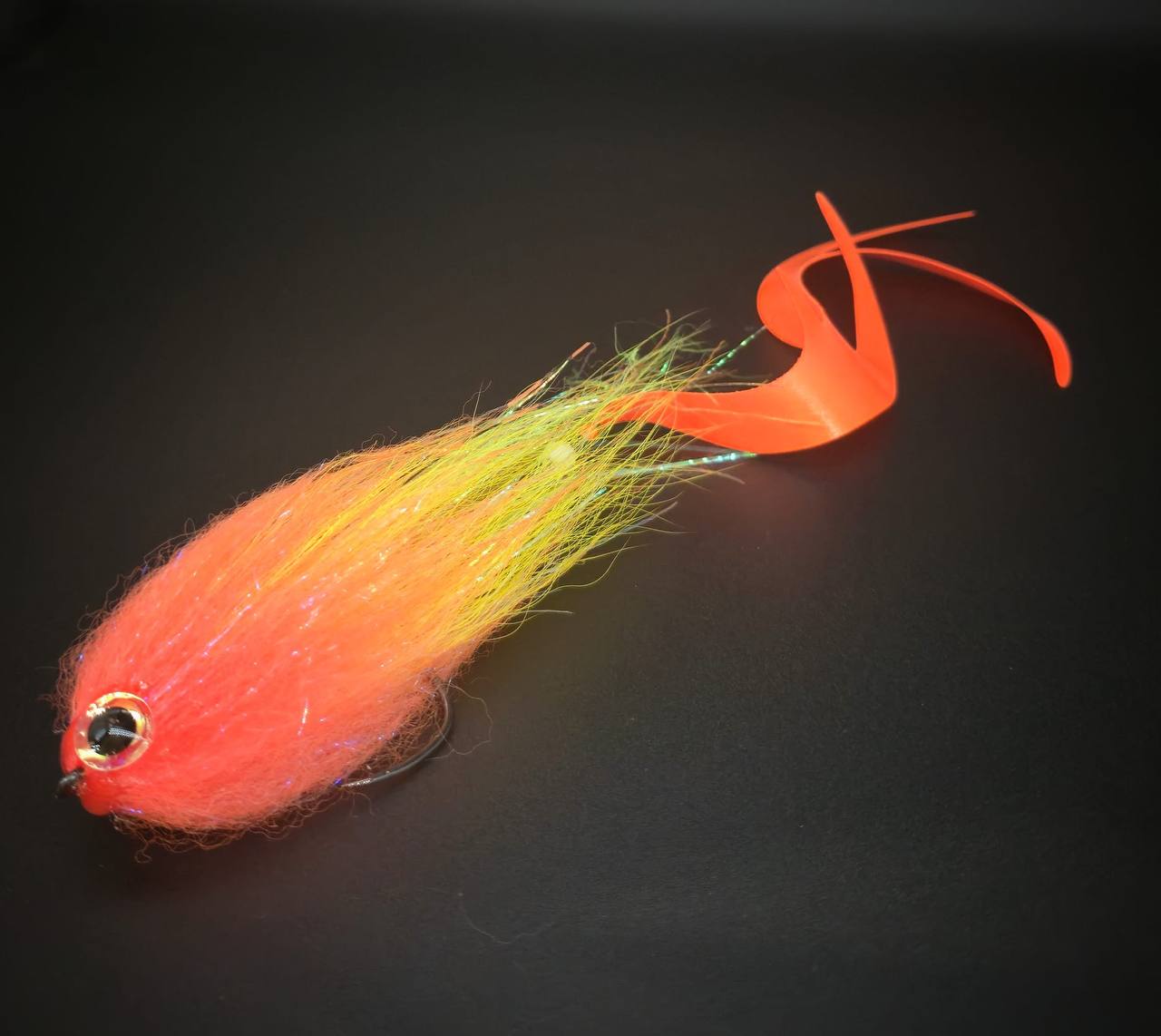 An orange pike fly